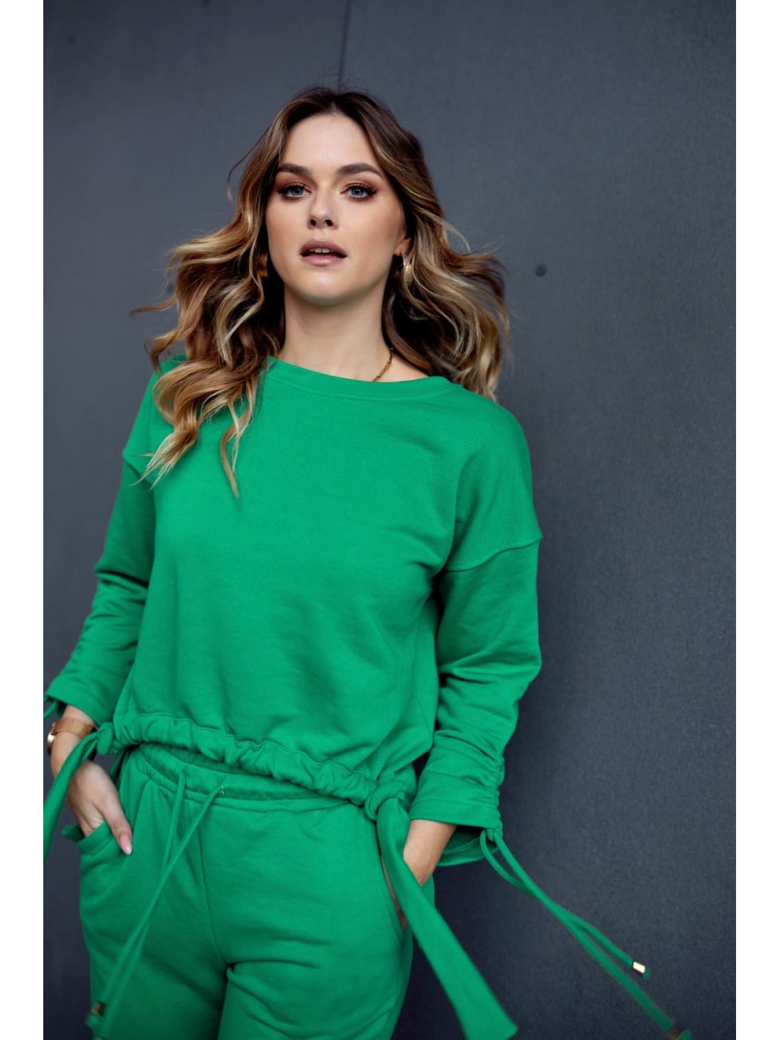 Smooth women\'s tracksuit with an asymmetric sweatshirt, green FI731 - Online store - Boutique